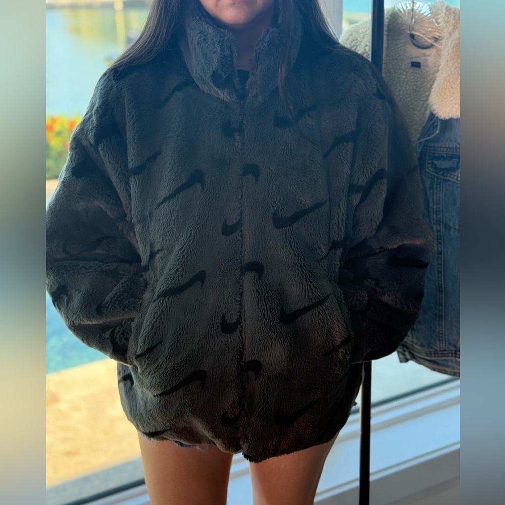 Nike Women’s Faux Fur Swoosh Jacket.